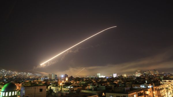Damascus sky lights up with service to air missile fire as the U.S. launches an attack on Syria targeting different parts of the Syrian capital Damascus, Syria, early Saturday, April 14, 2018. Damascus sky lights up with service to air missile fire as the U.S. launches an attack on Syria targeting different parts of the Syrian capital Damascus, Syria, early Saturday, April 14, 2018. - Sputnik International