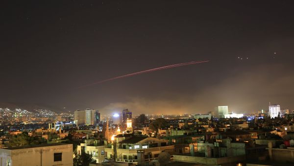 Damascus skies erupt with anti-aircraft fire as the U.S. launches an attack on Syria targeting different parts of the Syrian capital Damascus, Syria, early Saturday, April 14, 2018. Syria's capital has been rocked by loud explosions that lit up the sky with heavy smoke as U.S. President Donald Trump announced airstrikes in retaliation for the country's alleged use of chemical weapons. Damascus skies erupt with anti-aircraft fire as the U.S. launches an attack on Syria targeting different parts of the Syrian capital Damascus, Syria, early Saturday, April 14, 2018. Syria's capital has been rocked by loud explosions that lit up the sky with heavy smoke as U.S. President Donald Trump announced airstrikes in retaliation for the country's alleged use of chemical weapons. - Sputnik International