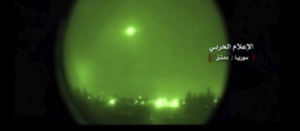 This frame grab from video provided by the government-controlled Syrian Central Military Media, shows missile flying over the capital Damascus during airstrikes by the United States, France and Britain, in Syria, Saturday, April 14, 2018 This frame grab from video provided by the government-controlled Syrian Central Military Media, shows missile flying over the capital Damascus during airstrikes by the United States, France and Britain, in Syria, Saturday, April 14, 2018 - Sputnik International