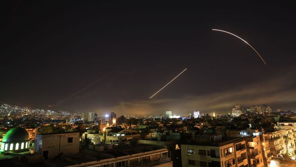 Missiles streak across the Damascus skyline as the U.S. launches an attack on Syria targeting different parts of the capital, early Saturday, April 14, 2018 Missiles streak across the Damascus skyline as the U.S. launches an attack on Syria targeting different parts of the capital, early Saturday, April 14, 2018 - Sputnik International