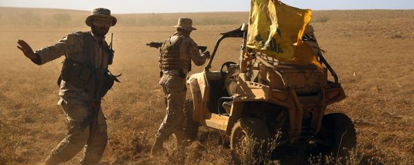 FILE - In this July 29, 2017 file photo,Hezbollah fighters stand near a four-wheel motorcycle positioned at the site where clashes erupted between Hezbollah and al-Qaida-linked fighters in Wadi al-Kheil or al-Kheil Valley in the Lebanon-Syria border FILE - In this July 29, 2017 file photo,Hezbollah fighters stand near a four-wheel motorcycle positioned at the site where clashes erupted between Hezbollah and al-Qaida-linked fighters in Wadi al-Kheil or al-Kheil Valley in the Lebanon-Syria border - Sputnik International