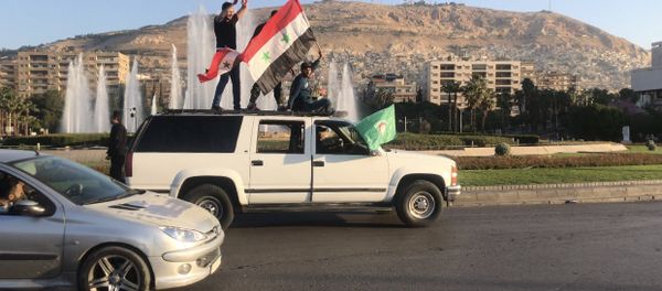 Hundreds of Syrians are demonstrating in the Syrian capital Damascus Hundreds of Syrians are demonstrating in the Syrian capital Damascus - Sputnik International