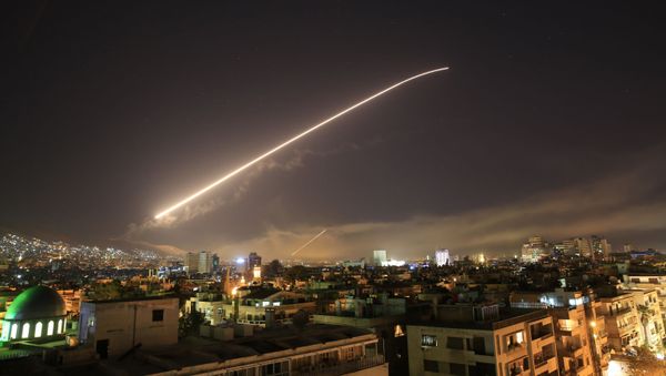 The Damascus sky lights up missile fire as the U.S. launches an attack on Syria targeting different parts of the capital early Saturday, April 14, 2018 - Sputnik International