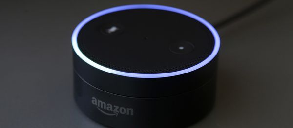 March 2, 2016 photo shows an Echo Dot in San Francisco. Amazon.com is introducing two devices, the Amazon Tap and Echo Dot, that are designed to amplify the role that its voice-controlled assistant Alexa plays in people's homes and lives - Sputnik International