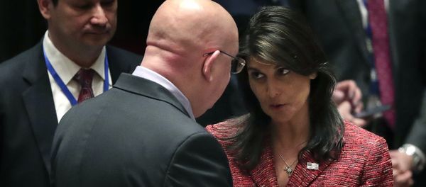 United States Ambassador to the United Nations Nikki Haley, right, talks with Russian Ambassador to the United Nations Vasily Nebenzya before a Security Council meeting, Tuesday, April 10, 2018, at United Nations headquarters - Sputnik International