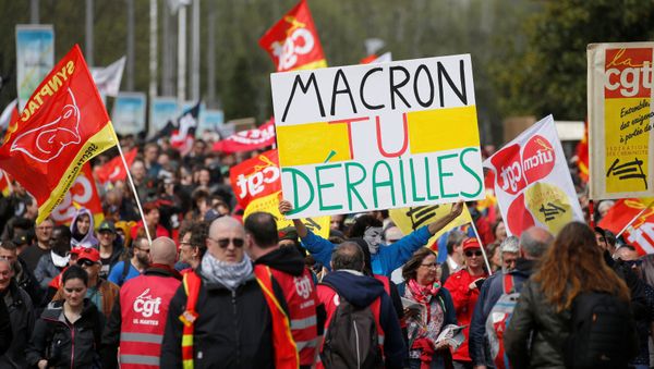 French railway employees and CGT labour union members demonstrate against government reforms in Nantes, France, April 14, 2018. Placard reads, Macron you've derailed French railway employees and CGT labour union members demonstrate against government reforms in Nantes, France, April 14, 2018. Placard reads, Macron you've derailed - Sputnik International