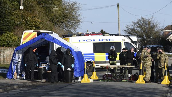 Various police, Army and other emergency service personal attend a scene in Durrington near Salisbury, England, Monday March 19, 2018, as a car is taken away for further investigation into the suspected nerve agent attack on Russian double agent Sergei Skripal and his daughter Yulia Various police, Army and other emergency service personal attend a scene in Durrington near Salisbury, England, Monday March 19, 2018, as a car is taken away for further investigation into the suspected nerve agent attack on Russian double agent Sergei Skripal and his daughter Yulia - Sputnik International