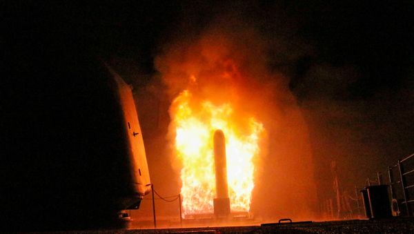 The U.S. Navy guided-missile cruiser USS Monterey fires a Tomahawk land attack missile April 14, 2018 The U.S. Navy guided-missile cruiser USS Monterey fires a Tomahawk land attack missile April 14, 2018 - Sputnik International
