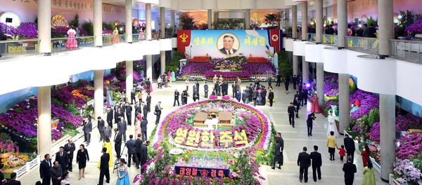 People are seen during the 20th Kimilsungia Festival on the occasion of the birth anniversary of founder Kim Il-sung in this undated photo released by North Korea's Korean Central News Agency (KCNA) in Pyongyang April 13, 2018 People are seen during the 20th Kimilsungia Festival on the occasion of the birth anniversary of founder Kim Il-sung in this undated photo released by North Korea's Korean Central News Agency (KCNA) in Pyongyang April 13, 2018 - Sputnik International