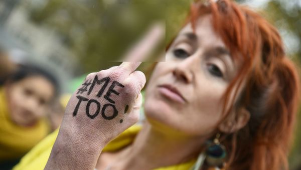 A woman with the message Me too on her hand gives the middle finger during a gathering against gender-based and sexual violence called by the Effronté-e-s Collective, on the Place de la Republique square in Paris on October 29, 2017 A woman with the message Me too on her hand gives the middle finger during a gathering against gender-based and sexual violence called by the Effronté-e-s Collective, on the Place de la Republique square in Paris on October 29, 2017 - Sputnik International