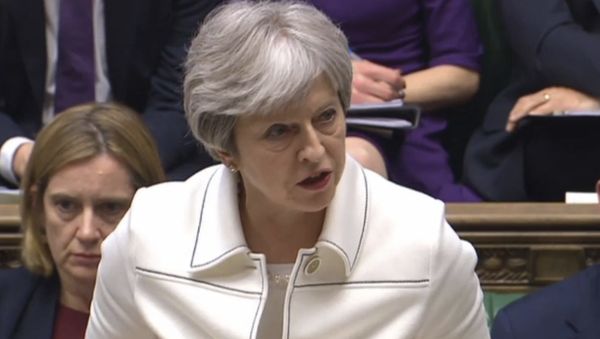 Britain's Prime Minister Theresa May makes a statement to MPs in the House of Commons in London, Monday April 16, 2018 over her decision to launch air strikes against Syria. Britain's Prime Minister Theresa May makes a statement to MPs in the House of Commons in London, Monday April 16, 2018 over her decision to launch air strikes against Syria. - Sputnik International