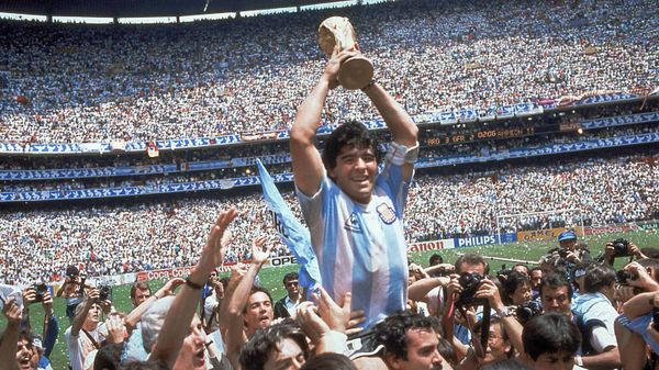 Diego Maradona of Argentina celebrates with the cup at the end of the World Cup soccer final in the Atzeca Stadium, in Mexico City, Mexico. (File) - Sputnik International