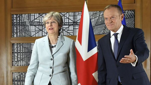 British Prime Minister Theresa May, left, walks with European Council President Donald Tusk prior to a meeting at the Europa building in Brussels on Friday, Dec. 8, 2017. British Prime Minister Theresa May, left, walks with European Council President Donald Tusk prior to a meeting at the Europa building in Brussels on Friday, Dec. 8, 2017. - Sputnik International