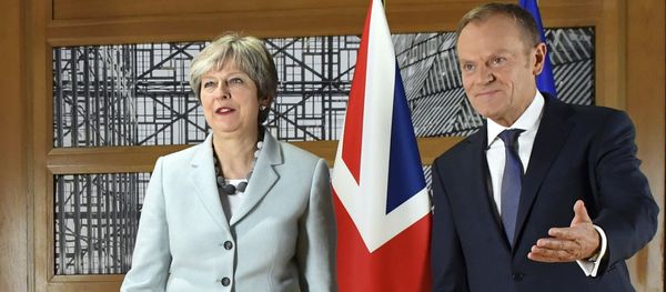 British Prime Minister Theresa May, left, walks with European Council President Donald Tusk prior to a meeting at the Europa building in Brussels on Friday, Dec. 8, 2017. British Prime Minister Theresa May, left, walks with European Council President Donald Tusk prior to a meeting at the Europa building in Brussels on Friday, Dec. 8, 2017. - Sputnik International