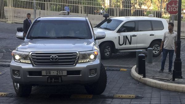 United Nations vehicles carry the team of the Organization for the Prohibition of Chemical Weapons (OPCW), arrive at hotel hours after the U.S., France and Britian launched an attack on Syrian facilities to punish President Bashar Assad for suspected chemical attack against civilians, in Damascus, Syria, Saturday, April 14, 2018 United Nations vehicles carry the team of the Organization for the Prohibition of Chemical Weapons (OPCW), arrive at hotel hours after the U.S., France and Britian launched an attack on Syrian facilities to punish President Bashar Assad for suspected chemical attack against civilians, in Damascus, Syria, Saturday, April 14, 2018 - Sputnik International