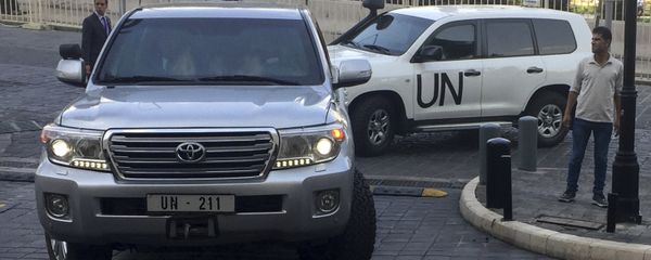 United Nations vehicles carry the team of the Organization for the Prohibition of Chemical Weapons (OPCW), arrive at hotel hours after the U.S., France and Britian launched an attack on Syrian facilities to punish President Bashar Assad for suspected chemical attack against civilians, in Damascus, Syria, Saturday, April 14, 2018 United Nations vehicles carry the team of the Organization for the Prohibition of Chemical Weapons (OPCW), arrive at hotel hours after the U.S., France and Britian launched an attack on Syrian facilities to punish President Bashar Assad for suspected chemical attack against civilians, in Damascus, Syria, Saturday, April 14, 2018 - Sputnik International