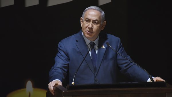 Israeli Prime Minister Benjamin Netanyahu speaks at the official ceremony for Israel's Memorial Day for fallen soldiers, at the National Memorial Hall for Israel's Fallen, in Mt. Herzl Military Cemetery, Jerusalem, Wednesday, April 18, 2018. - Sputnik International
