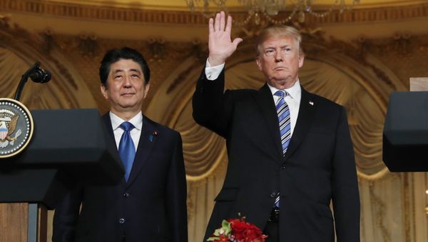 U.S. President Donald Trump (R) waves at the conclusion of a joint press conference with Japan's Prime Minister Shinzo Abe at Trump's Mar-a-Lago estate in Palm Beach, Florida, U.S., April 18, 2018 U.S. President Donald Trump (R) waves at the conclusion of a joint press conference with Japan's Prime Minister Shinzo Abe at Trump's Mar-a-Lago estate in Palm Beach, Florida, U.S., April 18, 2018 - Sputnik International