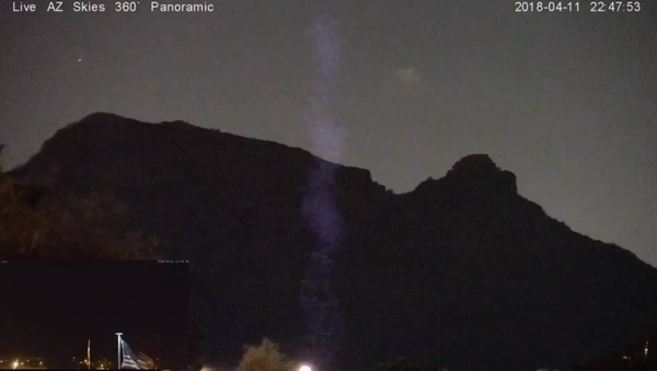 Video shows purple beams and UFO hovering in Arizona skies Video shows purple beams and UFO hovering in Arizona skies - Sputnik International