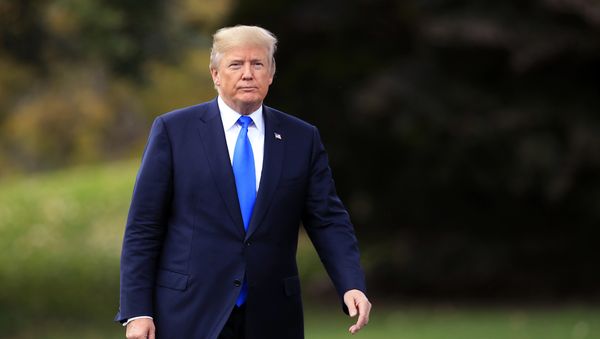 In this Friday, Oct. 13, 2017, file photo, President Donald Trump walks towards reporters on the South Lawn of the White House in Washington - Sputnik International