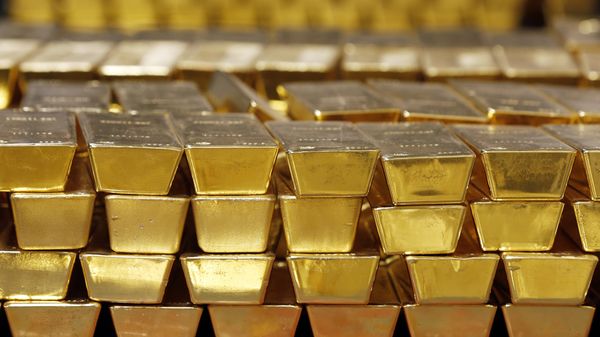 In this Tuesday, July 22, 2014, file photo, gold bars are stacked in a vault at the United States Mint, in West Point, N.Y.  - Sputnik International