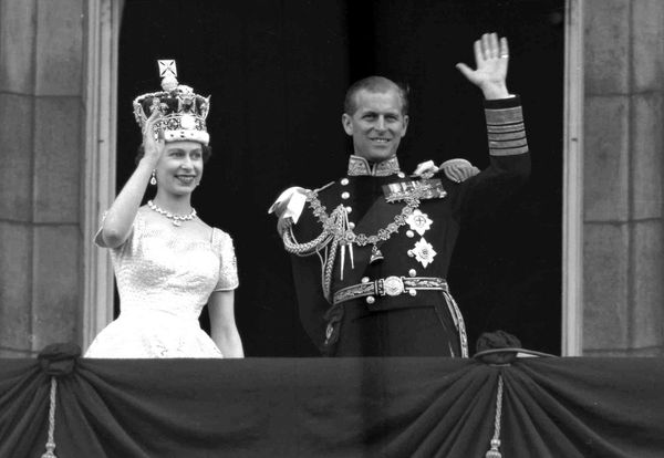 This is a 2 June 1953 file photo of Britain's Queen Elizabeth II and Prince Philip, Duke of Edinburgh, as they wave to supporters from the balcony at Buckingham Palace, following her coronation at Westminster Abbey in London. - Sputnik International