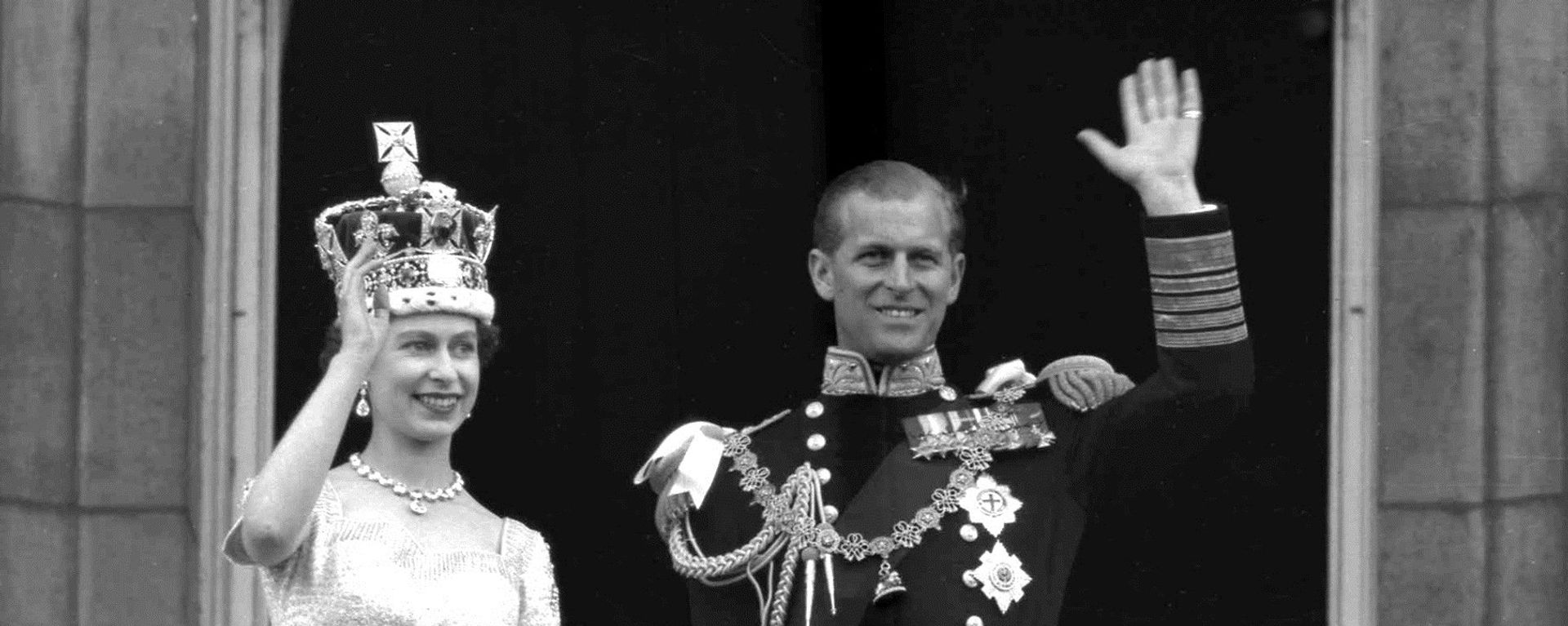 This is a June. 2, 1953 file photo of Britain's Queen Elizabeth II and Prince Philip, Duke of Edinburgh, as they wave to supporters from the balcony at Buckingham Palace, following her coronation at Westminster Abbey. London This is a June. 2, 1953 file photo of Britain's Queen Elizabeth II and Prince Philip, Duke of Edinburgh, as they wave to supporters from the balcony at Buckingham Palace, following her coronation at Westminster Abbey. London - Sputnik International, 1920, 10.02.2021