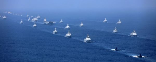 In this April 12, 2018 photo released by Xinhua News Agency, the Liaoning aircraft carrier is accompanied by navy frigates and submarines conducting an exercises in the South China Sea In this April 12, 2018 photo released by Xinhua News Agency, the Liaoning aircraft carrier is accompanied by navy frigates and submarines conducting an exercises in the South China Sea - Sputnik International