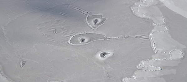 Unexplained holes in arctic sea Unexplained holes in arctic sea - Sputnik International
