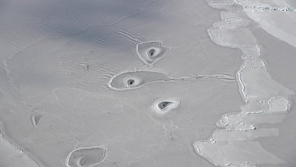 Unexplained holes in arctic sea Unexplained holes in arctic sea - Sputnik International
