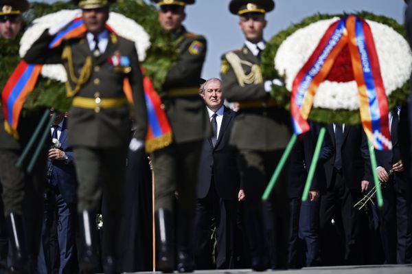 Armenian President Armen Sargsyan, center, during the ceremony of laying flowers at the eternal flame at the Armenian Genocide Victims Memorial in Yerevan Armenian President Armen Sargsyan, center, during the ceremony of laying flowers at the eternal flame at the Armenian Genocide Victims Memorial in Yerevan - Sputnik International