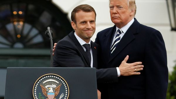 U.S. President Donald Trump and French President Emmanuel Macron attend an arrival ceremony at the White House in Washington, U.S., April 24, 2018 - Sputnik International