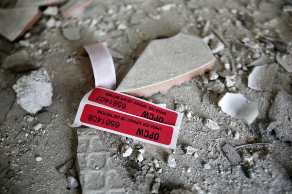 Labels of the Organisation for the Prohibition of Chemical Weapons (OPCW) are seen iside a damaged house in Douma in Damascus, Syria April 23, 2018 - Sputnik International
