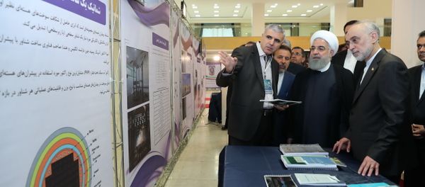 President Hassan Rouhani listens to explanations on new nuclear achievements at a ceremony to mark National Nuclear Day, in Tehran, Iran, Monday, April 9, 2018 President Hassan Rouhani listens to explanations on new nuclear achievements at a ceremony to mark National Nuclear Day, in Tehran, Iran, Monday, April 9, 2018 - Sputnik International