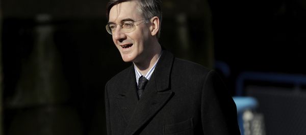 British Conservative Party Member of Parliament (MP) and Brexiteer Jacob Rees-Mogg arrives to speak to the media on Embankment Pier without boarding a fishing boat that went on to take part in a protest stunt with fish being thrown off it into the River Thames outside the Houses of Parliament in London, Wednesday, March 21, 2018 - Sputnik International