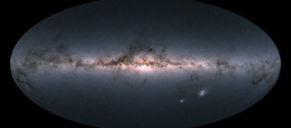 Gaia’s all-sky view of our Milky Way Galaxy and neighbouring galaxies, based on measurements of nearly 1.7 billion stars. The map shows the total brightness and colour of stars observed by the ESA satellite in each portion of the sky between July 2014 and May 2016. Gaia’s all-sky view of our Milky Way Galaxy and neighbouring galaxies, based on measurements of nearly 1.7 billion stars. The map shows the total brightness and colour of stars observed by the ESA satellite in each portion of the sky between July 2014 and May 2016. - Sputnik International