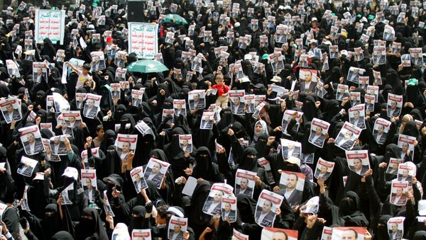 Houthi supporters hold picutres of the late Saleh al-Samad, a senior Houthi official, as they attend a rally to protest his killing by a Saudi-led coalition air strike in Hodeidah, in Sanaa, Yemen April 26, 2018 Houthi supporters hold picutres of the late Saleh al-Samad, a senior Houthi official, as they attend a rally to protest his killing by a Saudi-led coalition air strike in Hodeidah, in Sanaa, Yemen April 26, 2018 - Sputnik International