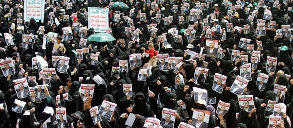 Houthi supporters hold picutres of the late Saleh al-Samad, a senior Houthi official, as they attend a rally to protest his killing by a Saudi-led coalition air strike in Hodeidah, in Sanaa, Yemen April 26, 2018 Houthi supporters hold picutres of the late Saleh al-Samad, a senior Houthi official, as they attend a rally to protest his killing by a Saudi-led coalition air strike in Hodeidah, in Sanaa, Yemen April 26, 2018 - Sputnik International