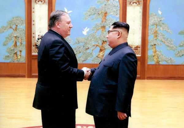 In this image released by the White House, then-CIA director Mike Pompeo shakes hands with North Korean leader Kim Jong Un in Pyongyang, North Korea, during a 2018 East weekend trip. In this image released by the White House, then-CIA director Mike Pompeo shakes hands with North Korean leader Kim Jong Un in Pyongyang, North Korea, during a 2018 East weekend trip. - Sputnik International