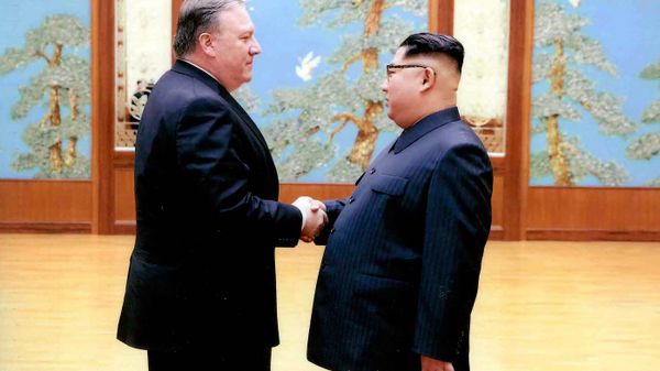 In this image released by the White House, then-CIA director Mike Pompeo shakes hands with North Korean leader Kim Jong Un in Pyongyang, North Korea, during a 2018 East weekend trip. - Sputnik International