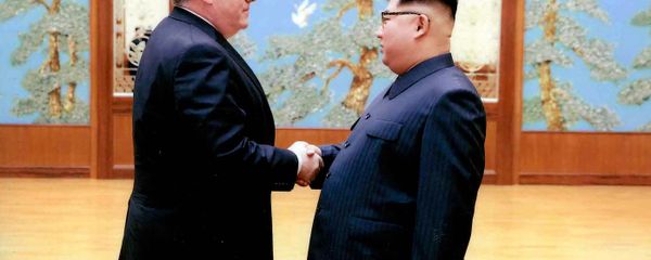 In this image released by the White House, then-CIA director Mike Pompeo shakes hands with North Korean leader Kim Jong Un in Pyongyang, North Korea, during a 2018 East weekend trip. In this image released by the White House, then-CIA director Mike Pompeo shakes hands with North Korean leader Kim Jong Un in Pyongyang, North Korea, during a 2018 East weekend trip. - Sputnik International