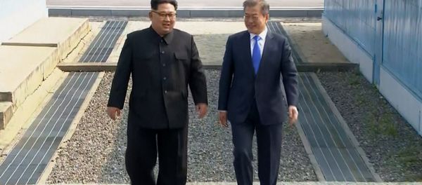 In this image taken from video provided by Korea Broadcasting System (KBS) Friday, April 27, 2018, North Korean leader Kim Jong Un, left, and South Korean President Moon Jae-in walk together as Kim crossed the border into South Korea for their historic face-to-face talks, in Panmunjom. In this image taken from video provided by Korea Broadcasting System (KBS) Friday, April 27, 2018, North Korean leader Kim Jong Un, left, and South Korean President Moon Jae-in walk together as Kim crossed the border into South Korea for their historic face-to-face talks, in Panmunjom. - Sputnik International