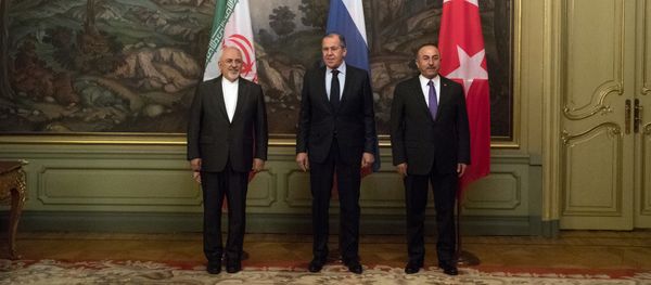 Russian Foreign Minister Sergey Lavrov, center, Turkey's Foreign Minister Mevlut Cavusoglu, right, and Iranian Foreign Minister Mohammad Javad Zarif pose for a photographers during their meeting in Moscow, Russia, Saturday, April 28, 2018 Russian Foreign Minister Sergey Lavrov, center, Turkey's Foreign Minister Mevlut Cavusoglu, right, and Iranian Foreign Minister Mohammad Javad Zarif pose for a photographers during their meeting in Moscow, Russia, Saturday, April 28, 2018 - Sputnik International