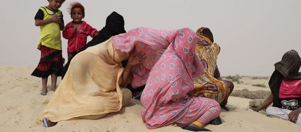 (File) In this photo taken on Thursday, Jan. 28, 2016, Tuareg woman and children gather near to homes that were burnt down, in Timbuktu , Mali (File) In this photo taken on Thursday, Jan. 28, 2016, Tuareg woman and children gather near to homes that were burnt down, in Timbuktu , Mali - Sputnik International