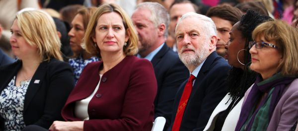 Britain's Home Secretary Amber Rudd sits next to Jeremy Corbyn, the leader of the Labour Party as they attend the unveiling of the statue of suffragist Millicent Fawcett on Parliament Square, in London, Britain, April 24, 2018 - Sputnik International