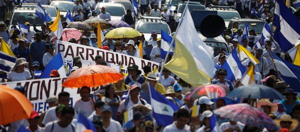 People take part in a protest march to demand an end to violence in Managua, Nicaragua, April 28, 2018 People take part in a protest march to demand an end to violence in Managua, Nicaragua, April 28, 2018 - Sputnik International