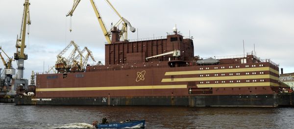 The Akademik Lomonosov floating nuclear power plant is towed from the Baltic Shipyard in St. Petersburg The Akademik Lomonosov floating nuclear power plant is towed from the Baltic Shipyard in St. Petersburg - Sputnik International