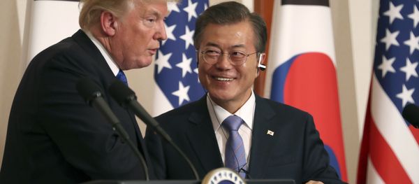 President Donald Trump, left, speaks as South Korean President Moon Jae-in looks on during a joint news conference at the Blue House in Seoul, South Korea, Tuesday, Nov. 7, 2017 President Donald Trump, left, speaks as South Korean President Moon Jae-in looks on during a joint news conference at the Blue House in Seoul, South Korea, Tuesday, Nov. 7, 2017 - Sputnik International
