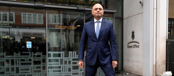 Sajid Javid stands outside the Home Office after being named as Britain's Home Secretary, in London, April 30, 2018. - Sputnik International