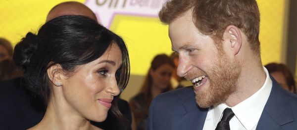 Britain's Prince Harry, left and Meghan Markle attend a women's empowerment reception at the Royal Aeronautical Society, during the Commonwealth Heads of Government Meeting, in London, Thursday April 19, 2018. - Sputnik International